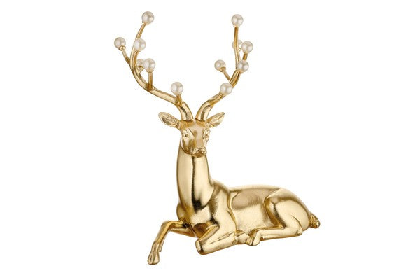 RENNA SEDUTA CON PERLE